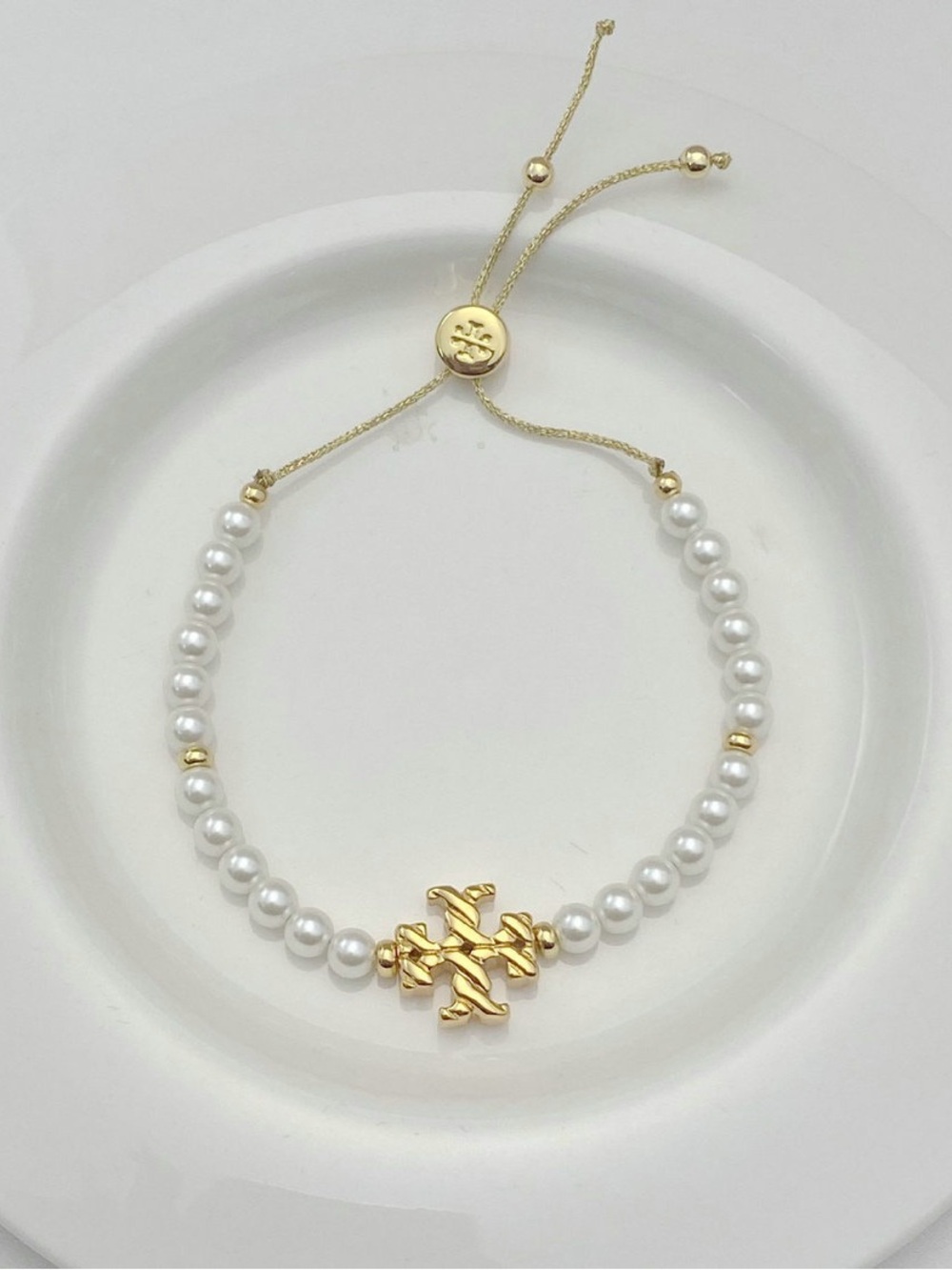 Tory Burch Gold and White Pearl Logo Adjustable Bracelet - Picture 2 of 5